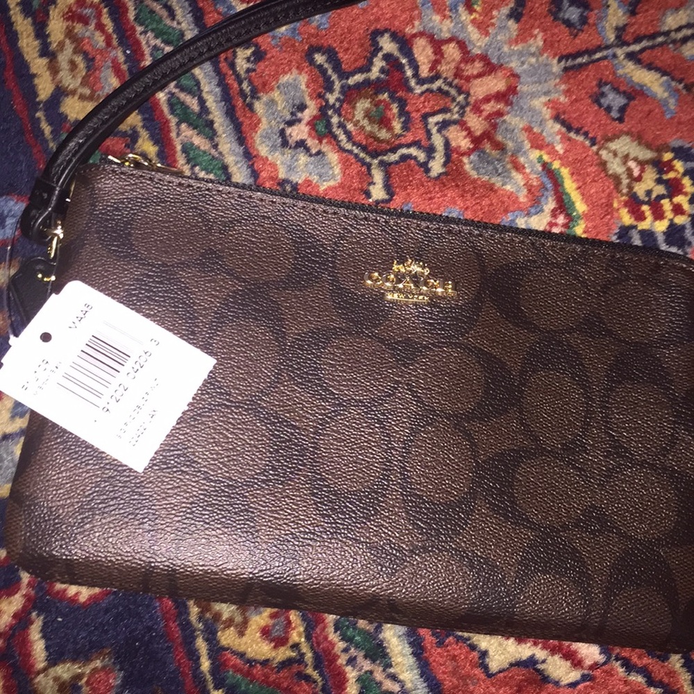 Never been used Coach wristlet